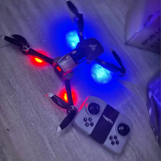 Kids quadcopter drone with colorful LED lights, black and gray