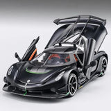 1:24 scale diecast toy car with open doors, black sports car, detailed cockpit