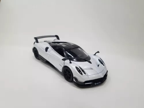 White 1:38 scale diecast sports car model with black hood and front grille details