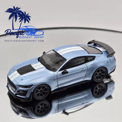 Light blue diecast sports coupe toy car with black accents and detailed wheels