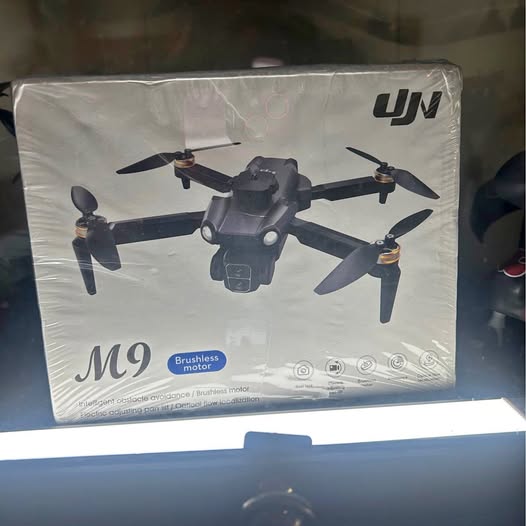 M9 brushless motor drone box with quadcopter pictured