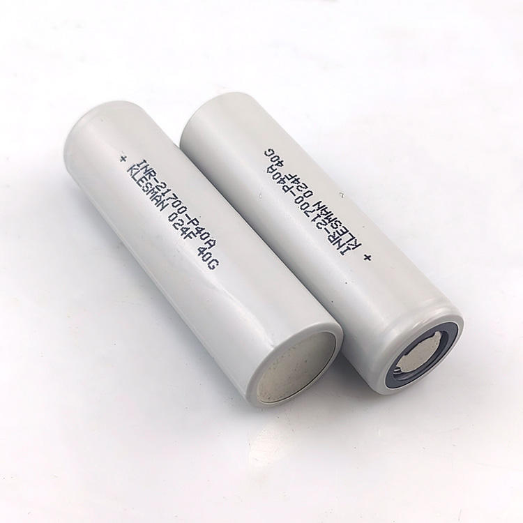 Lithium-ion battery cells, two cylindrical 21700 cells with printed markings