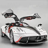 White and black diecast racing sports car model with open doors, front 3/4 view