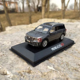 Gray SUV diecast model on display base