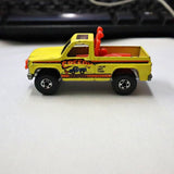 Hot Wheels 1:64 yellow vintage Super Scraper truck with red accents and open bed