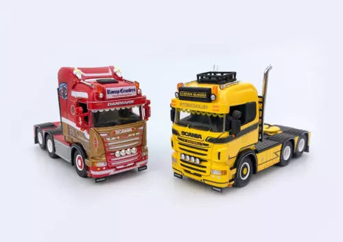 Diecast tractor unit model trucks, red and yellow front view