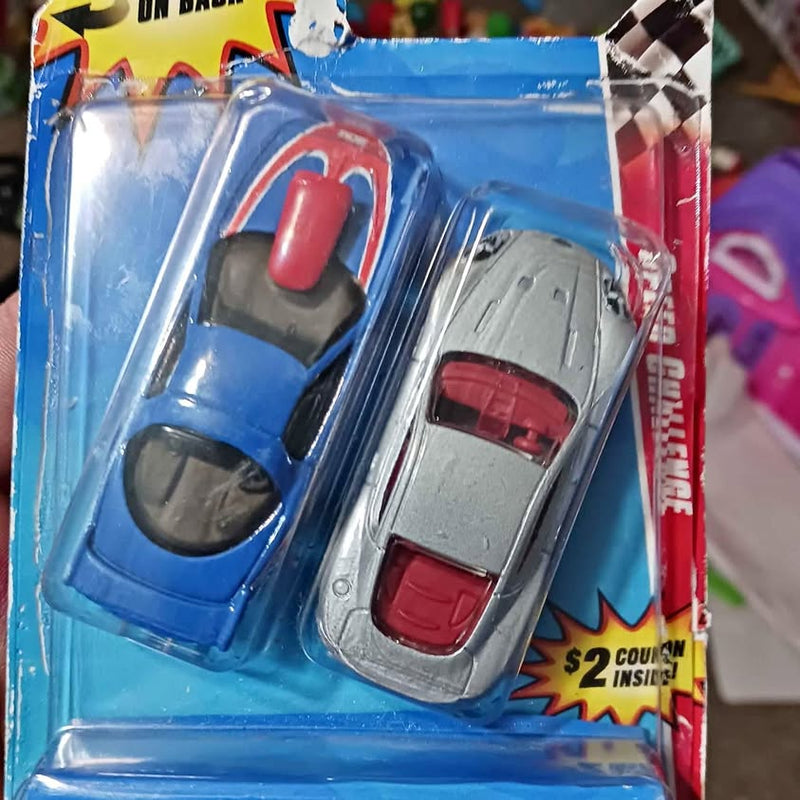 Hot Wheels diecast cars in blue blister pack, two vehicles