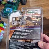 Diecast truck model in blister packaging, with GreenLight label