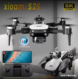 White quadcopter drone with front camera and four propeller arms