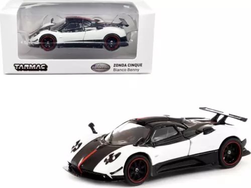 White and black diecast sports car model with red detailing and open cockpit style