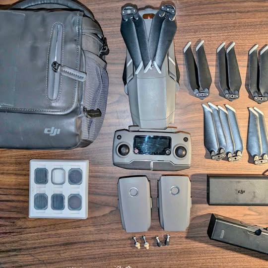 DJI Mavic 2 Pro drone kit with bag, extra batteries, propellers, and remote parts