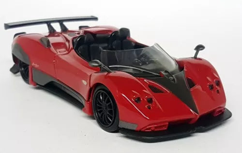 Red diecast sports car model with black aero details and open cockpit, front three-quarter view