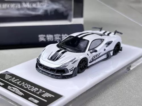 White 1:64 diecast sports car model with black wheels, front three-quarter view