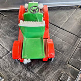 1/24 diecast toy car with red body and green cab, open steering wheel