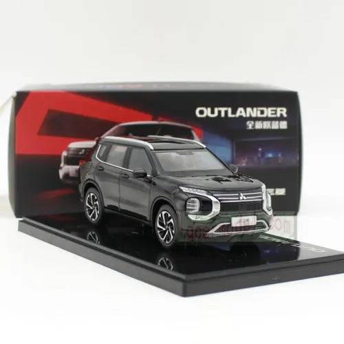 Black diecast 1:43 SUV model car with front 3/4 view on display base