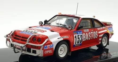 Red and white diecast rally car model with #153 decals, front 3/4 view