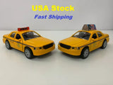 Yellow taxi diecast model toy car, 1:36 scale, front and side angles