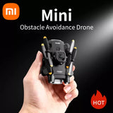 Mini obstacle avoidance drone, compact black body with yellow prop guards