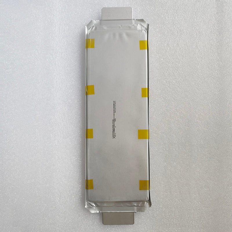 Solid state drone battery cell with yellow tape seals and connector tab