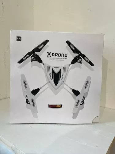 Remote control drone aircraft with four foldable propellers, white body