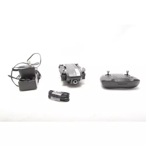 Foldable camera drone with gray controller and accessories