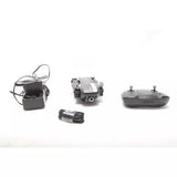 Foldable camera drone with gray controller and accessories