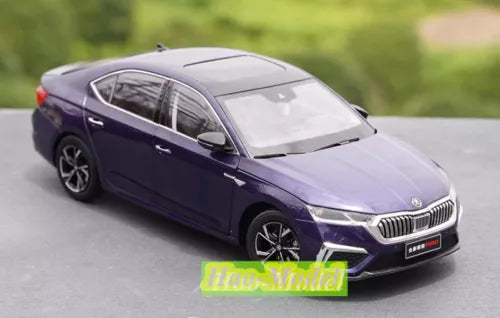 Diecast sedan car model, dark purple, front 3/4 view