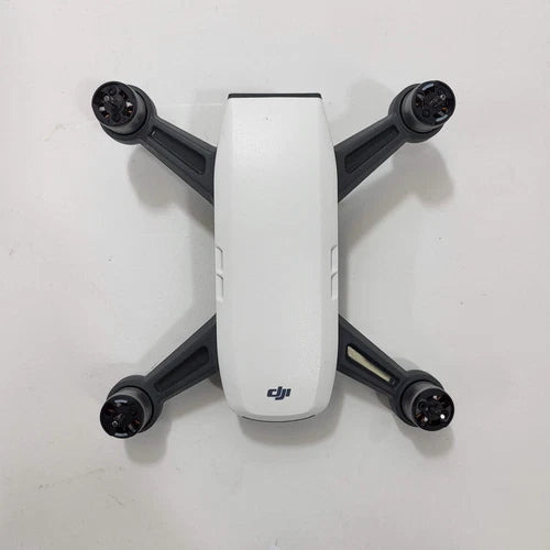 DJI Spark camera drone with white body and four black propellers
