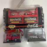 Coca-Cola Matchbox diecast car set with red trucks and cars, in retail box