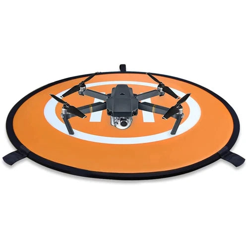 Universal drone landing pad with orange circular top and black rim