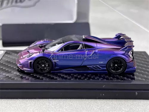 Purple and blue chameleon diecast sports car model on display base