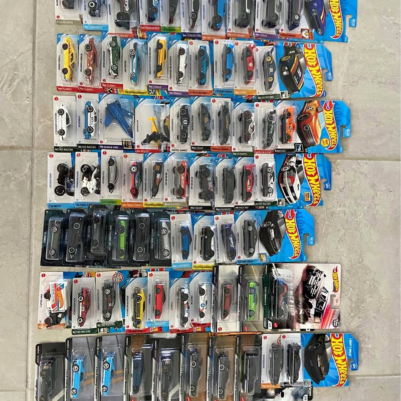 Die-cast toy cars, assorted designs on hanging card packages