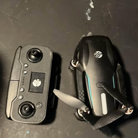 Vivitar Sky Flow drone with controller, black and gray