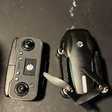 Vivitar Sky Flow drone with controller, black and gray