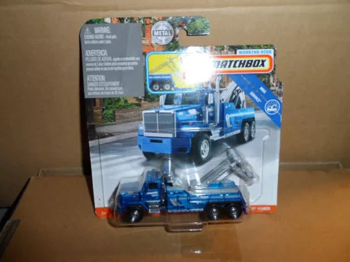 Blue diecast heavy-duty wrecker truck, HO scale, in clear blister packaging