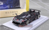 Black alloy diecast supercar model with rear spoiler and engine-vent detail on base