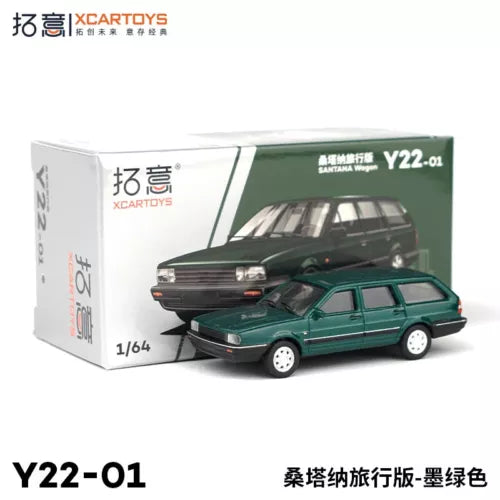 Green diecast wagon model car toy, front 3/4 view with open box