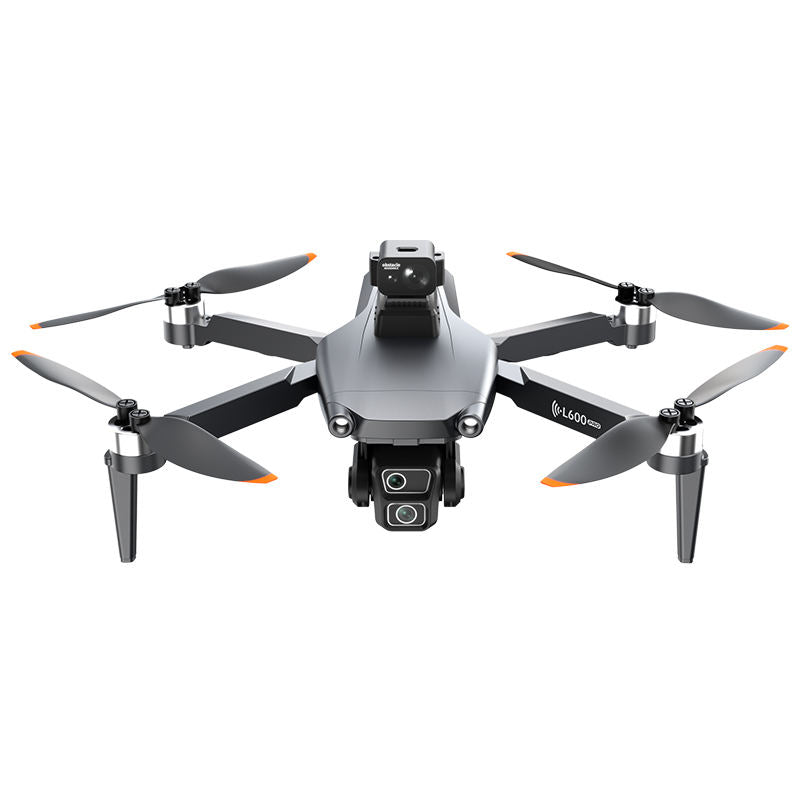 Gray quadcopter drone with camera, front controller screen, four foldable propellers