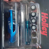 1/64 diecast collectible car set with blue car and spare wheels in blister pack