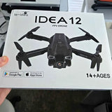 FPV drone with four propellers and front camera, shown on retail box