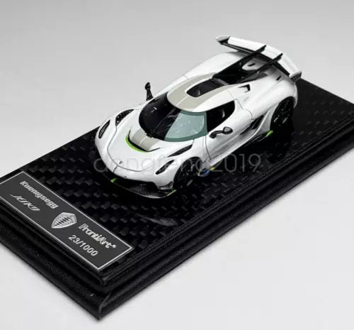 White 1:64 scale Jesko diecast resin sports car model on black display base