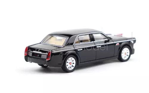 Black 1:64 scale luxury sedan diecast car model, front three-quarter view