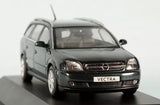 Dark green Opel Vectra diecast model car, front view with grille and headlights