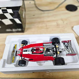Ferrari 312T diecast model race car in clear display tray, red and black details