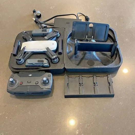 Foldable drone kit with controller and charging station, blue case