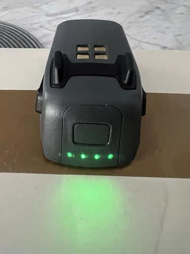 DJI Spark drone battery pack with green LED indicators