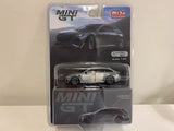 MINI GT 1:64 diecast model car in box, dark gray Audi wagon