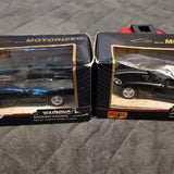 Maisto diecast toy car in open box, black sports car model shown