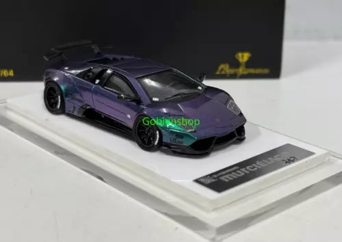 Purple and green 1:64 diecast sports car model with display base