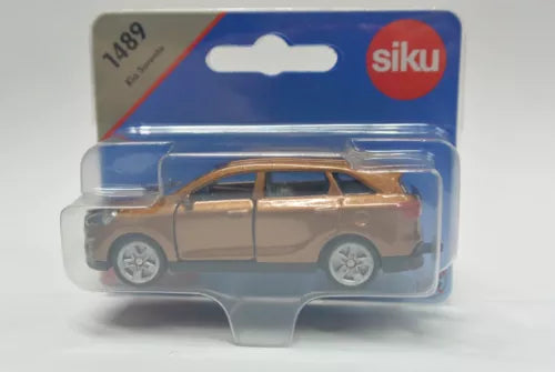 Brown die-cast SUV car with silver wheels in clear blister packaging